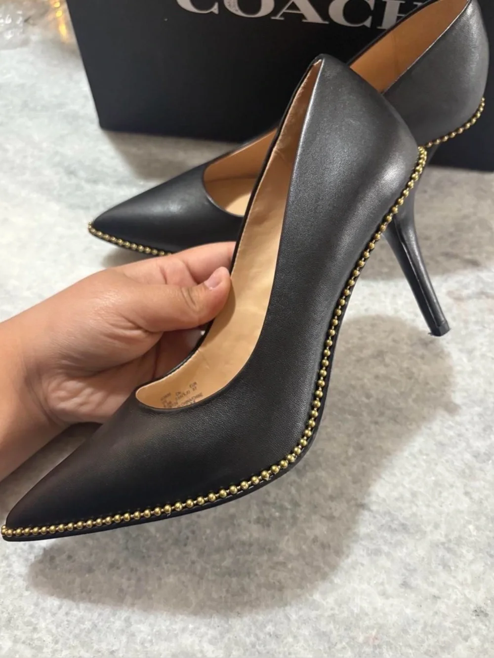 Coach black leather pointed toe pumps with gold studs size US 6.5